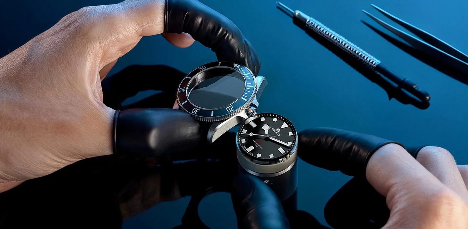 A finished watch photographed on rock, from the products index.
